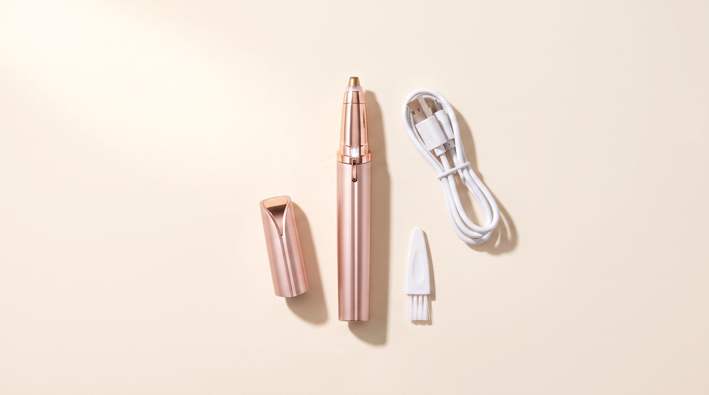 Contenido de la caja: Trilume, tapa, cable USB y cepillo